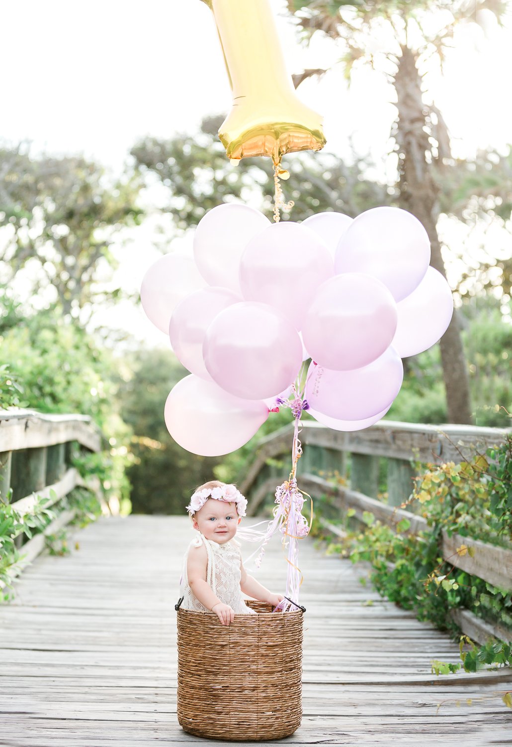 first birthday pictures with balloons and basket