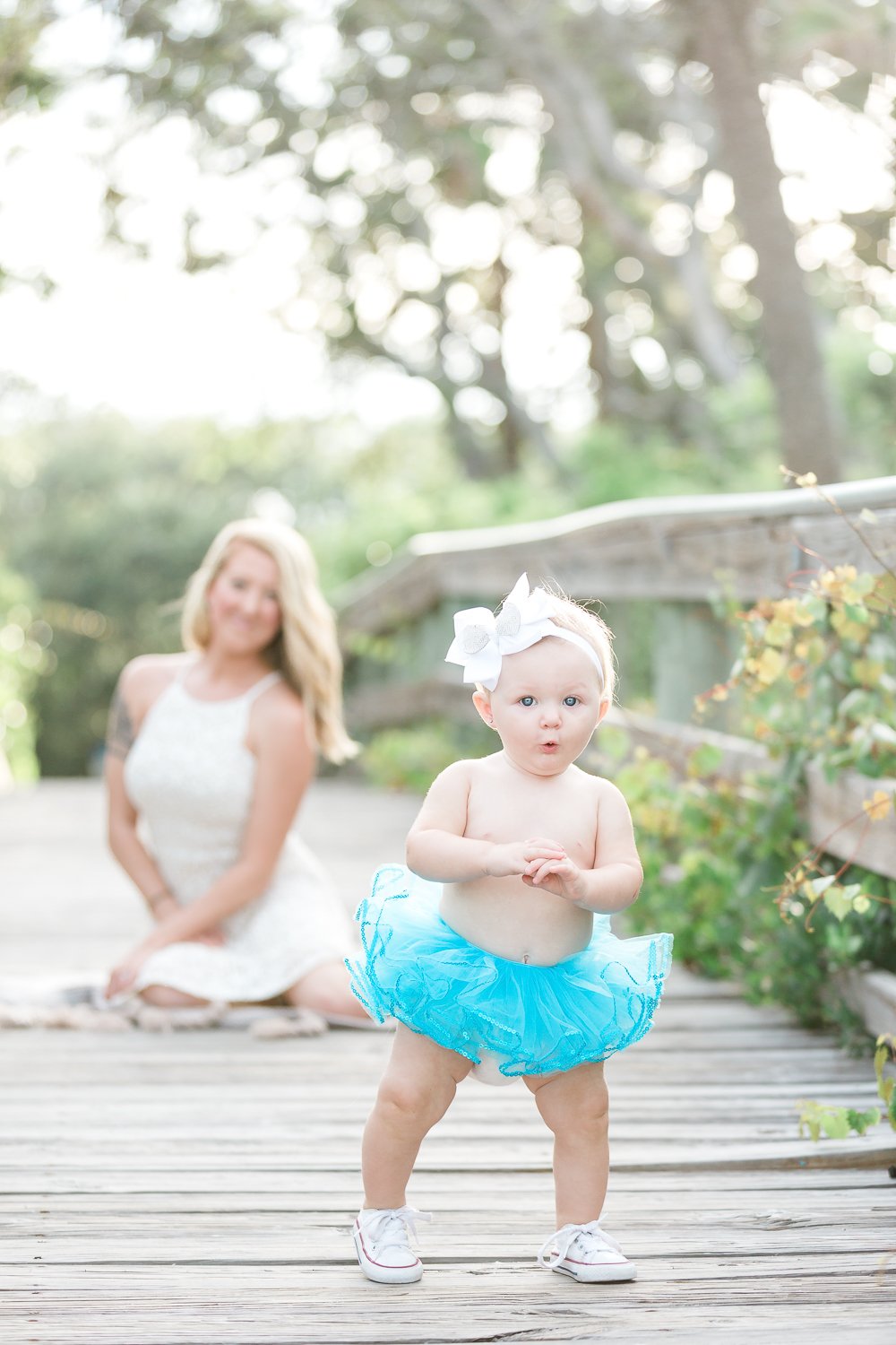 beach photoshoot with mommy and baby