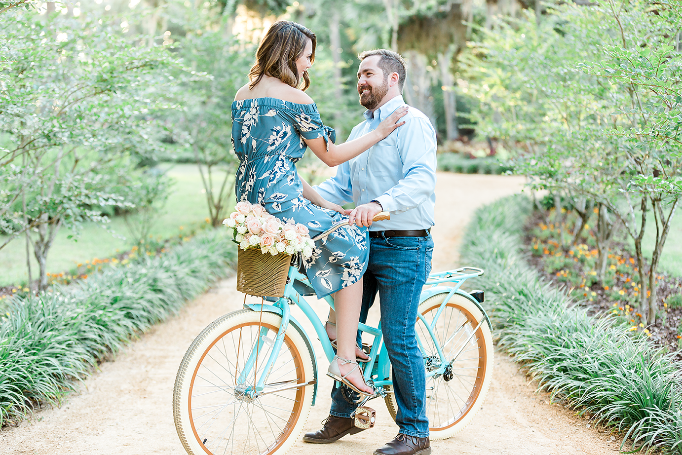 engagement pictures with beach cruiser bike and roses