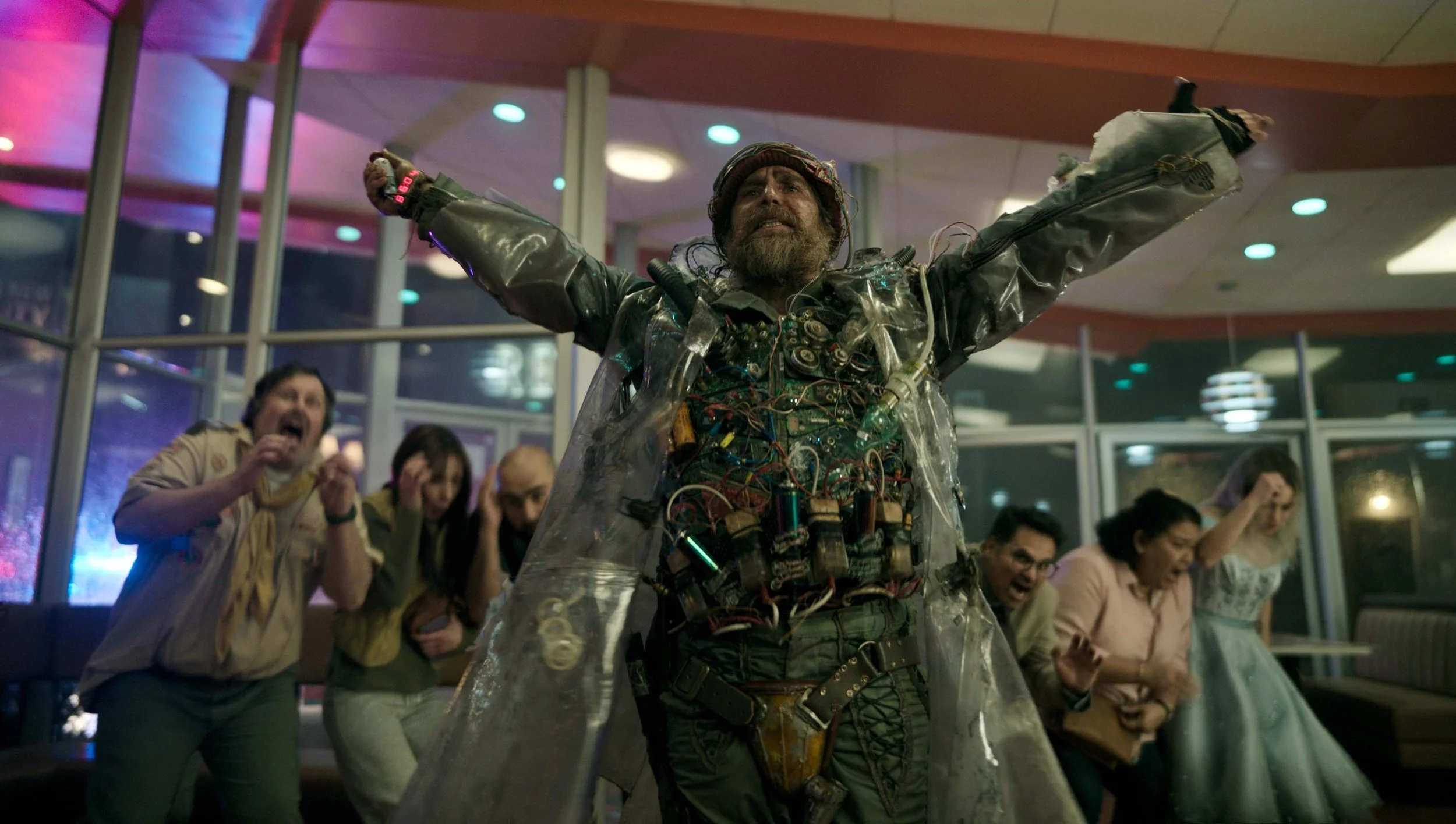 Sam Rockwell, Haley Lu Richardson, Michael Peña, Zazie Beetz, Asim Chaudhry, Georgia Goodman, and Juno Temple in Good Luck, Have Fun, Don't Die  (Briarcliff Entertainment)