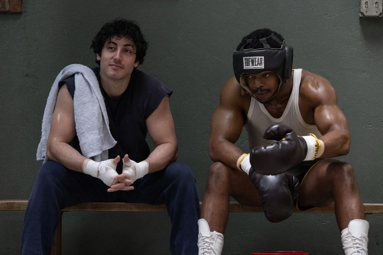 (L to R) Anthony Ippolito as Sylvester Stallone and Stephen James as Carl Weathers in I PLAY ROCKY, from Amazon MGM Studios. Photo Credit: Claire Folger © 2026 Amazon Content Services LLC. All Rights Reserved.