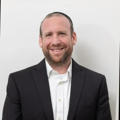 Zack Garelick, Founder and Fractional COO of Iceberg Non-Profit Consulting