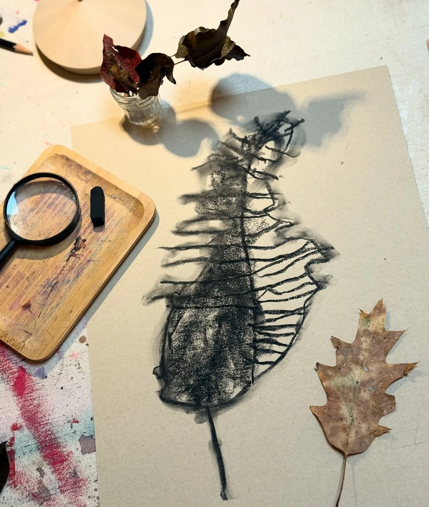 With charcoal on paper, preschool DoodleWorms studied fall leaves up close. We focused on slowing down and being close observers 🐌🔎. Moving carefully, we thought about when to smudge, when to press, and when to pause. Sometimes art is less about *w