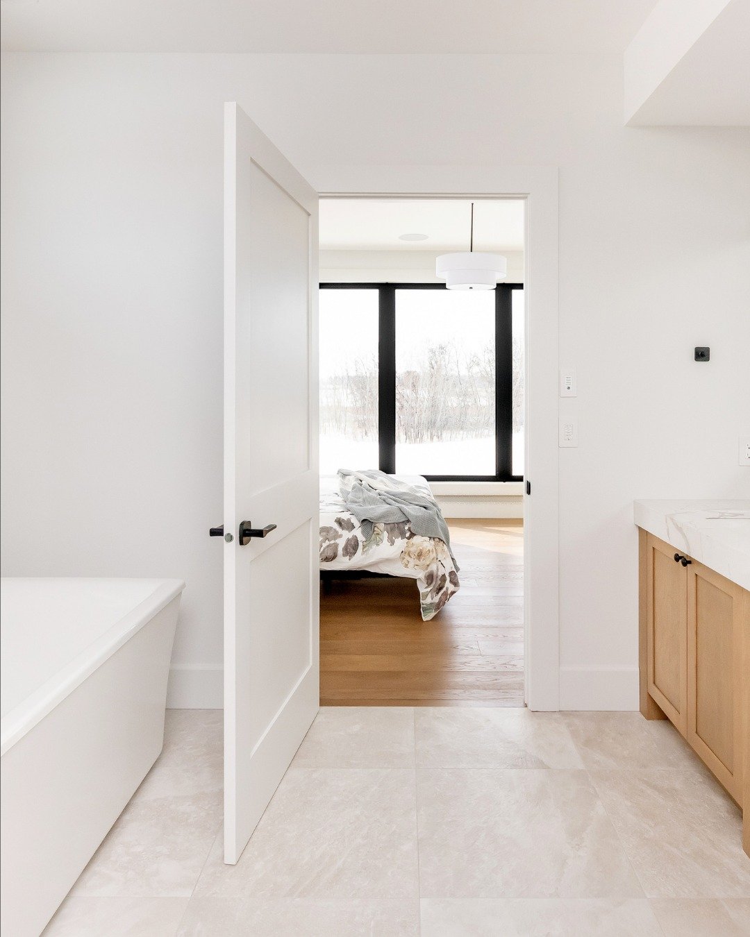 Not every great design feature is a showstopper.

Sometimes it's something as simple as making mornings run a little smoother.

For these homeowners, one gets up early for the gym while the other prefers a quieter start to the day. To accommodate bot