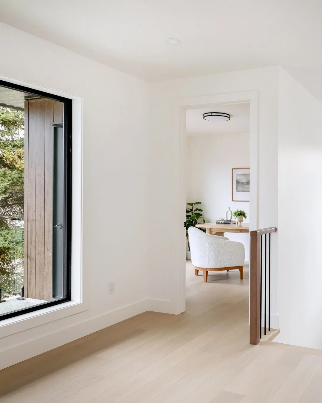 Work from home, but make it elevated.

A dedicated home office with large windows, natural light, warm finishes and a private balcony just outside the door.

Need a break? Step outside.

Need a change of scenery? The rest of the home is just steps aw