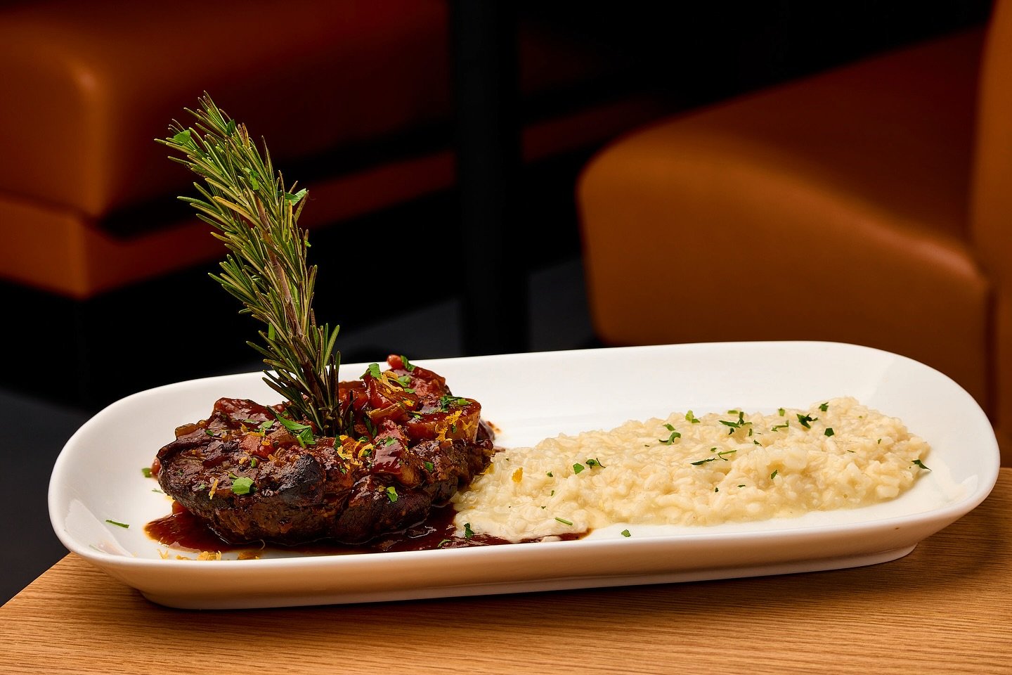 Barolo Braised Veal Osso Buco with Risotto! 
The tender, melt-in-your-mouth veal, simmered in rich Barolo wine, will transport your taste buds to new heights of gastronomic delight. 🌟🍷 Experience the epitome of Italian flavors and let your palate r