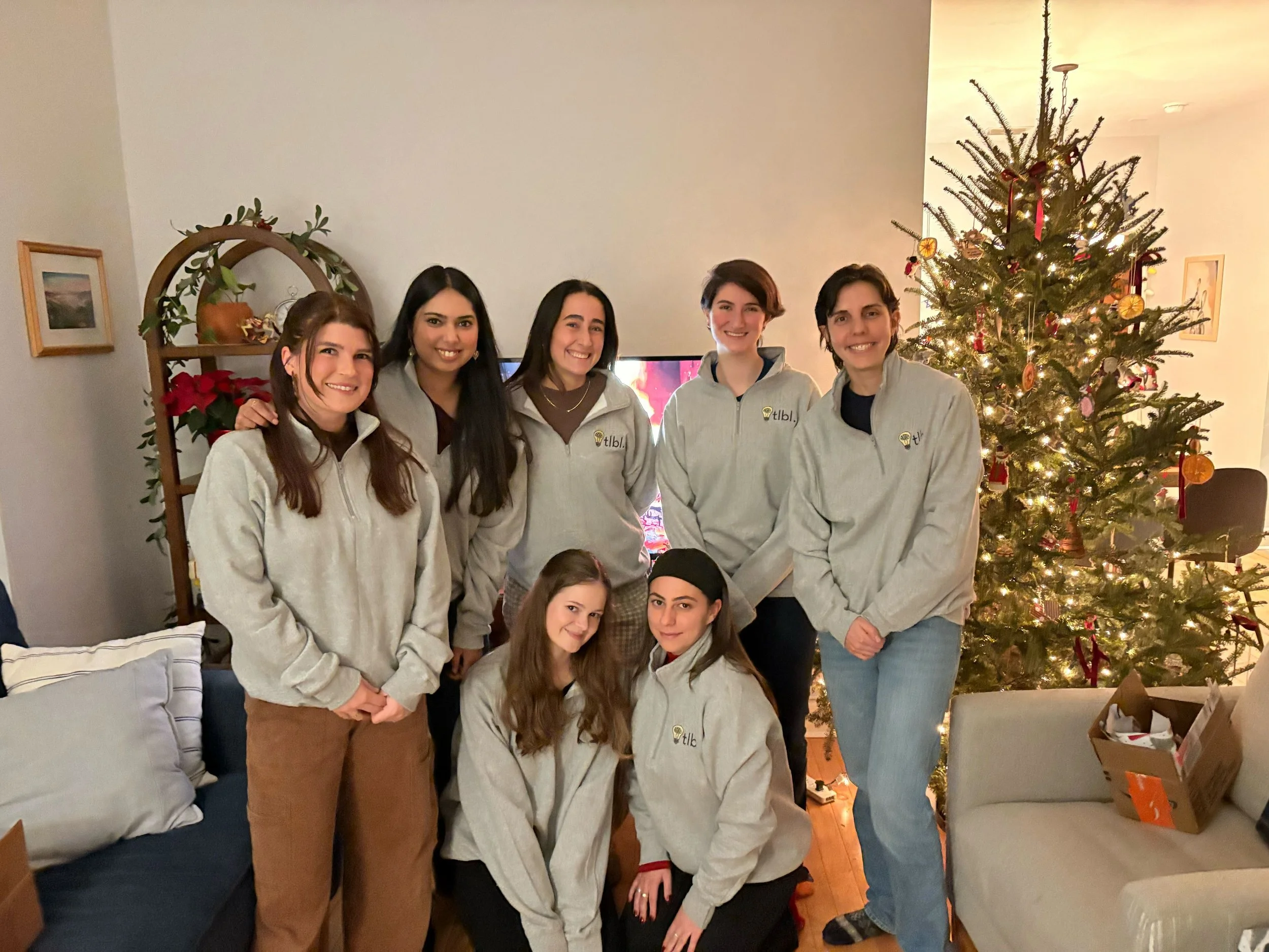 Dr. Nugiel hosted a cozy holiday get-together with plenty of sweet treats, fun moments, and time to celebrate together. The night ended with a fun surprise: brand-new TLBL quarter-zips to rep our team!