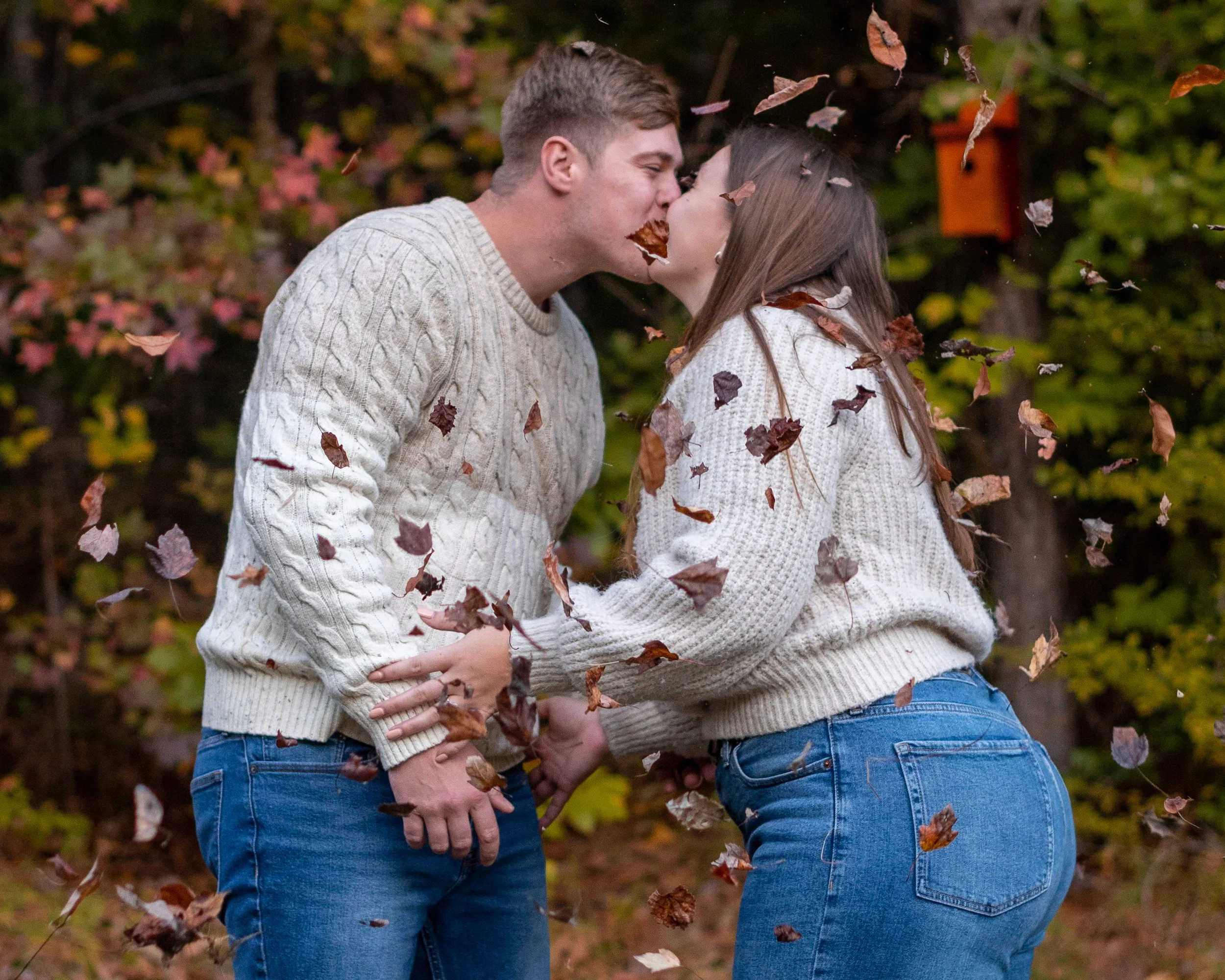 Fall Engagement photoshoot at De Hart Botanical gardens in Louisburg NC with leaves falling