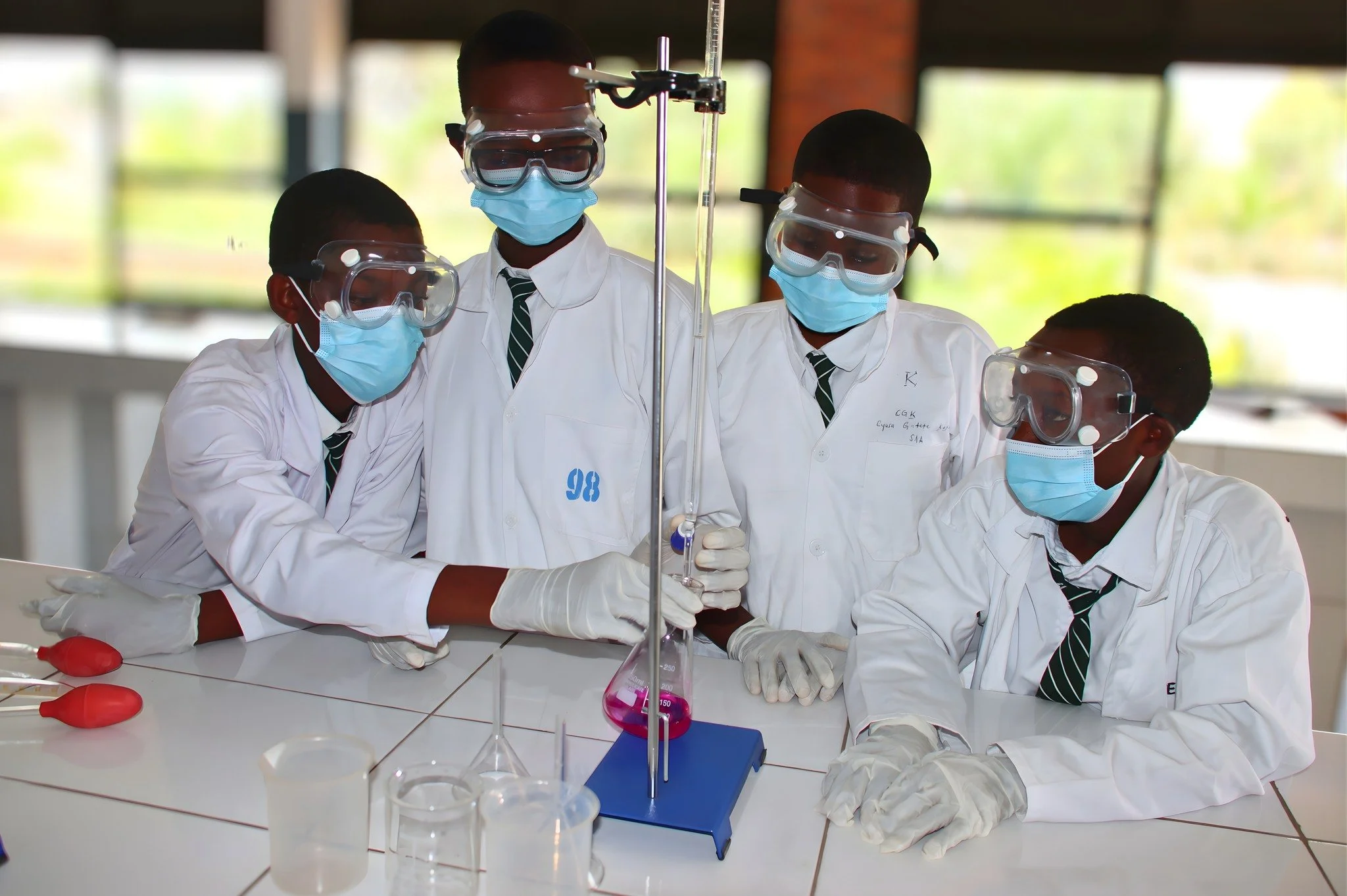 Outfitted in protective lab gear, these RCCS Secondary students are conducting an experiment in their chemistry class. These hands-on experiences boost students&rsquo; curiosity and engagement while helping them apply their chemistry knowledge and de
