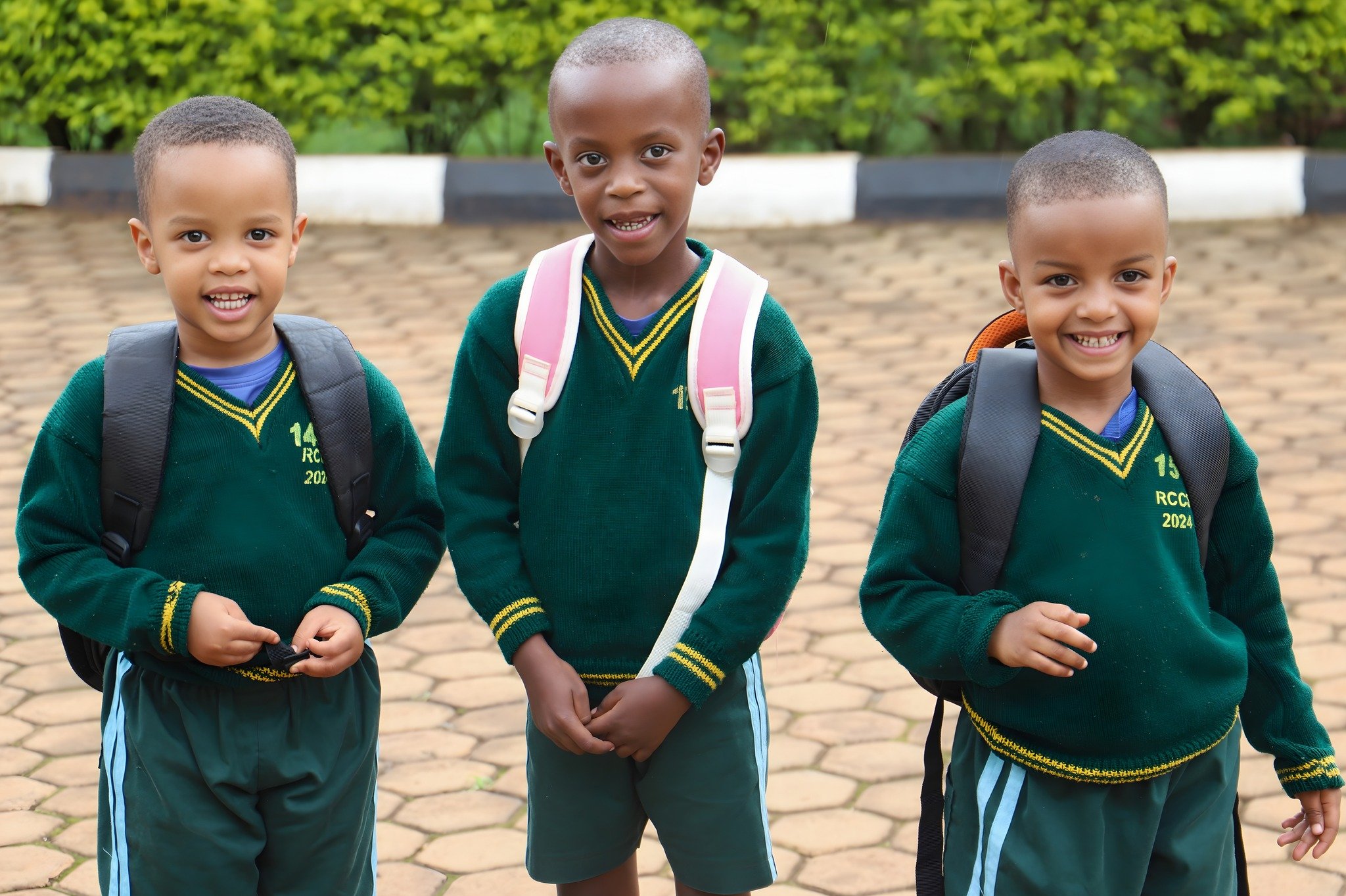 Happy Friday! Joanna, Winner, and Lianno, three of our Early Childhood Development students, begin their day with smiles that warm the heart. Our children love learning, and they are grateful for their teachers and friends who make their school days 