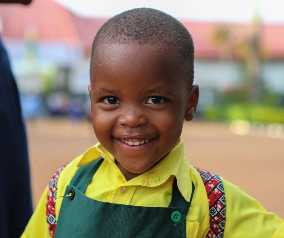 We asked Ange, one of our RCCS Early Childhood Development students, to give us a big smile, and she happily obliged. Ange told us that it is easy for her to smile because she is so happy to be in school at RCCS. She loves her teachers, her classmate
