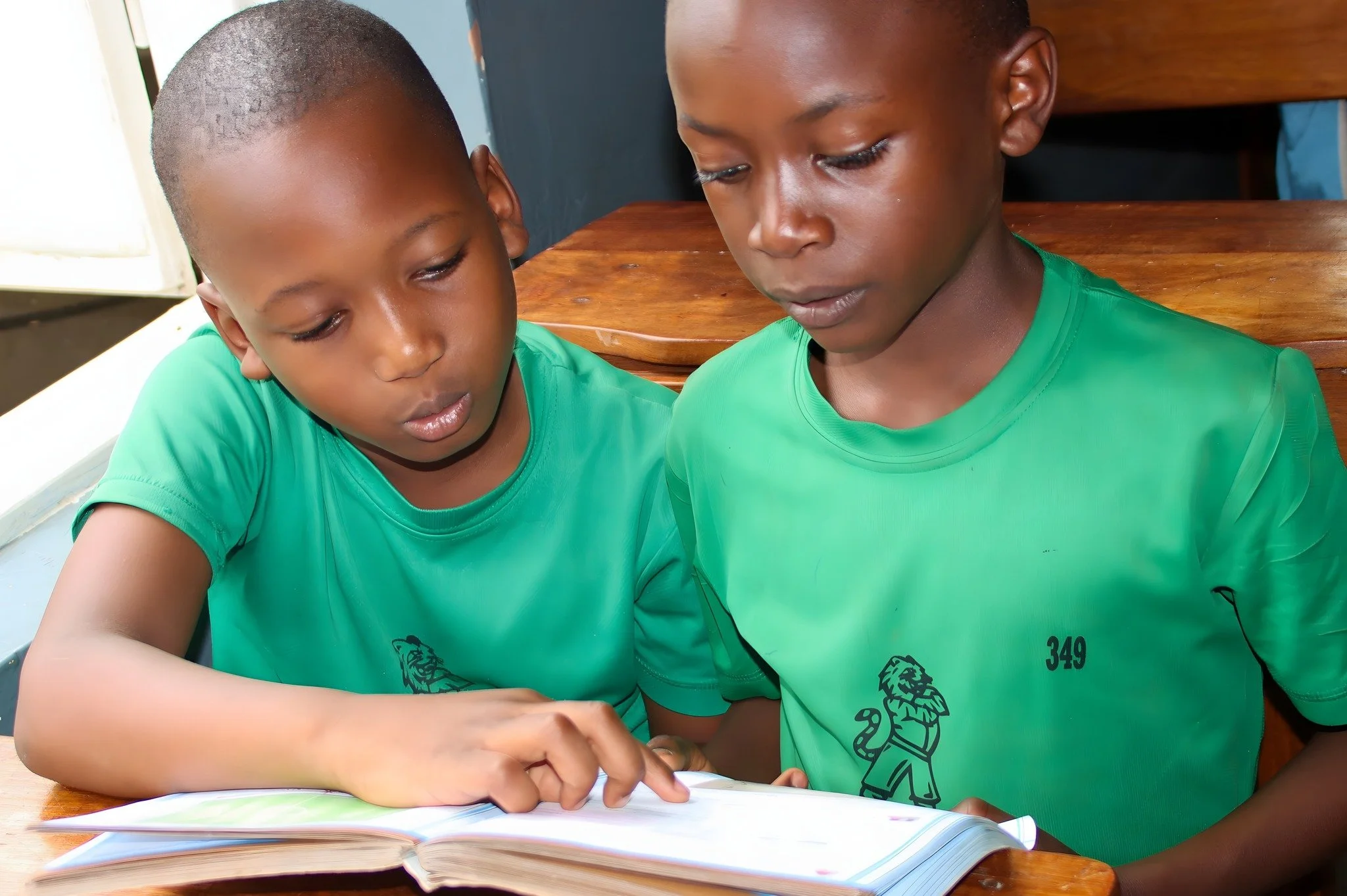 A whole world&mdash;right at their fingertips.

Brian and Theoneste are discovering just how far a book can take them. With every page they turn, they&rsquo;re exploring new places, ideas, and possibilities.

We&rsquo;re grateful for our two RCCS lib