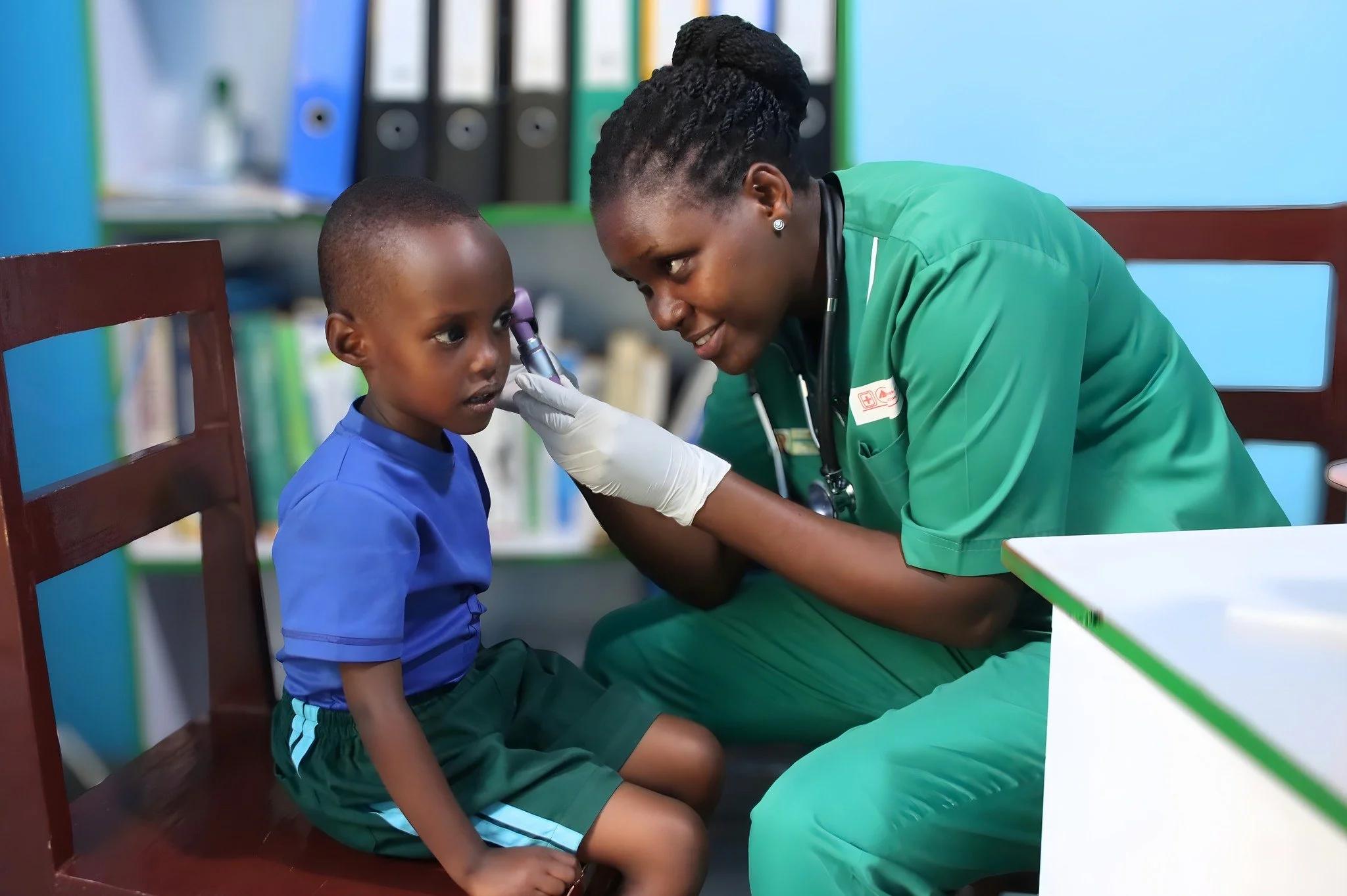 Healthy children learn, grow, and thrive.

During a recent wellness check, one of our RCCS Early Childhood Development students received attentive care from Sabine Mbabazi, director of our Health Center. These regular checkups help monitor growth and