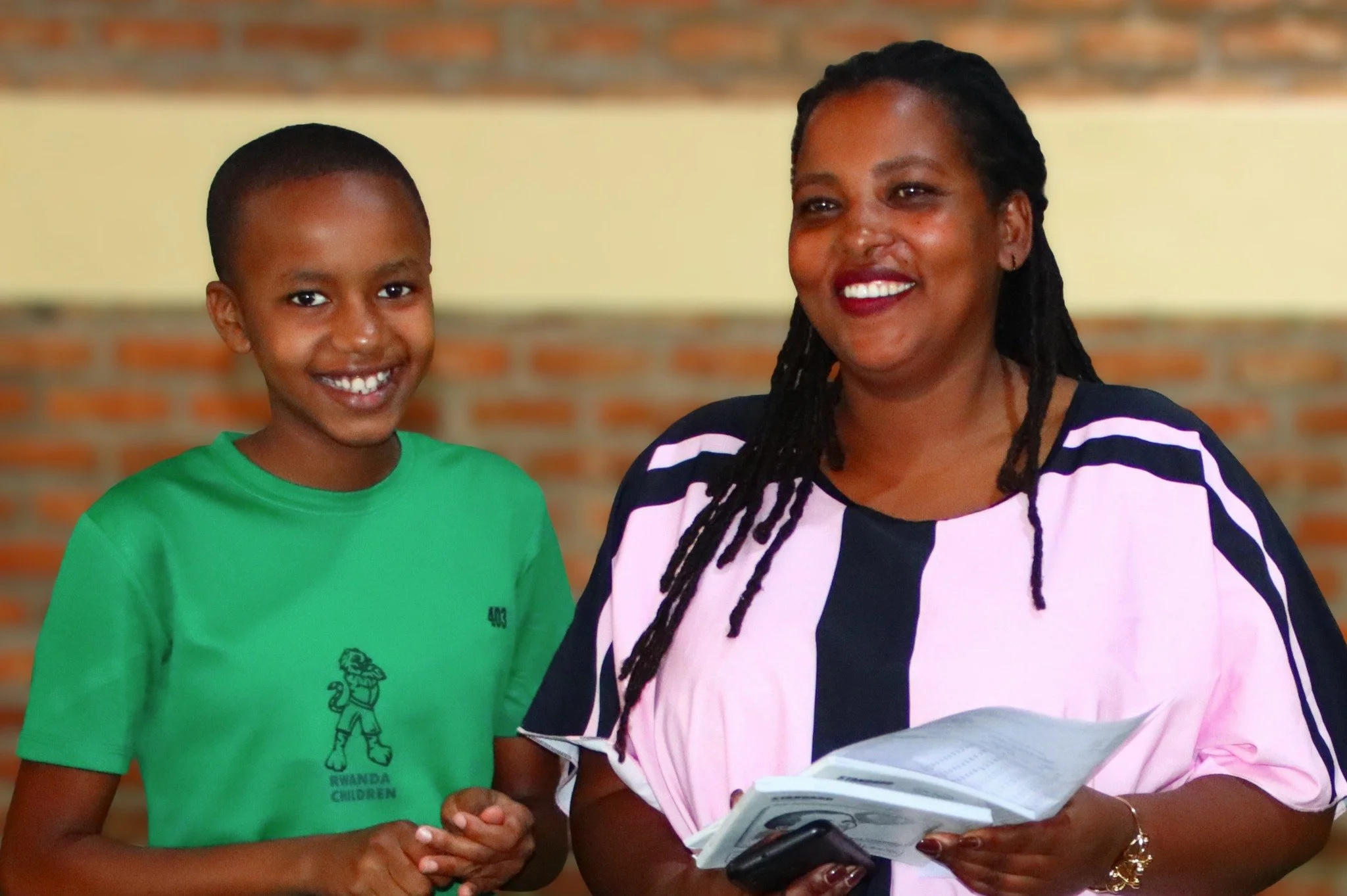 A proud moment&mdash;for Angel and her mother.

Angel stands alongside her mother as she receives the top student award in RCCS Primary 6&mdash;a reflection of her dedication and perseverance.

But this moment is about more than an award. It reflects