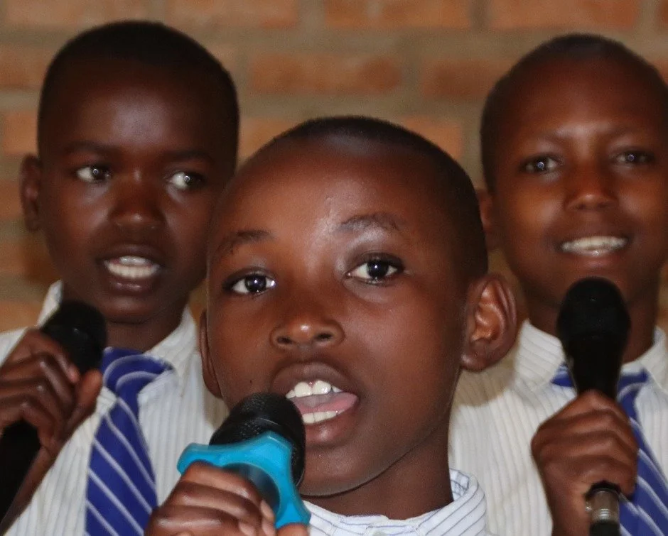 The &ldquo;Bruce&rdquo; Choir&mdash;named in honor of a friend who loved music&mdash;is hard at work rehearsing for Sunday worship.

Chanella, Divine, and Betty&mdash;three of our altos&mdash;love to sing&mdash;and it shows.

Moments like this are pa