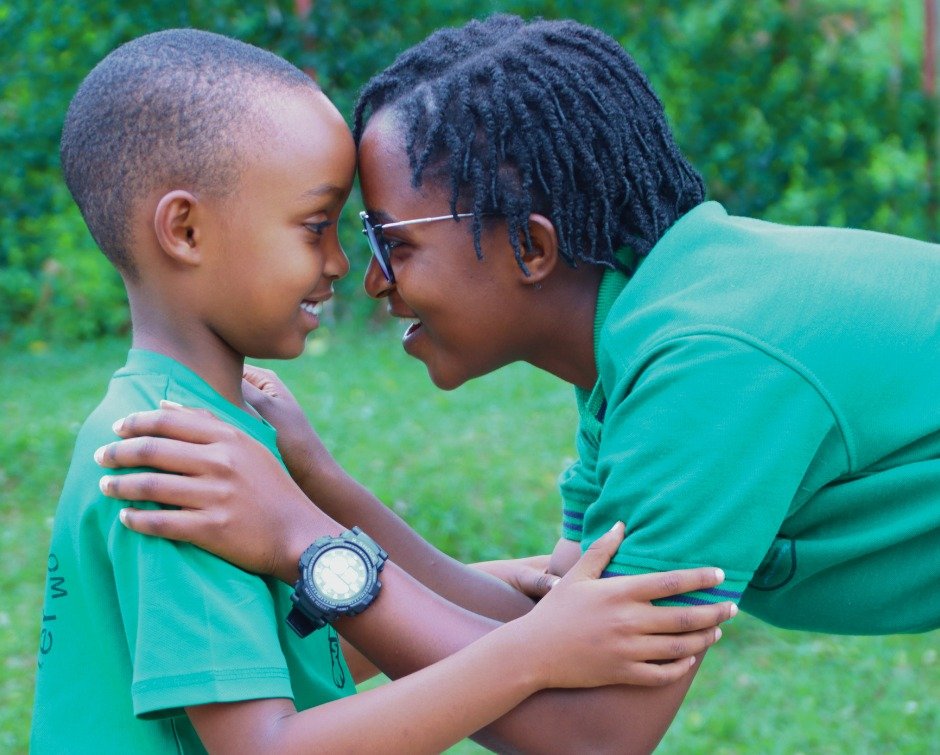 Meet Chania.

She is six years old and in Primary One. She loves playing soccer. When she grows up, she wants to become a doctor.

She told her teacher, Ester Mutuyimana, that she studies hard every day so she can achieve that dream. Then she smiled.