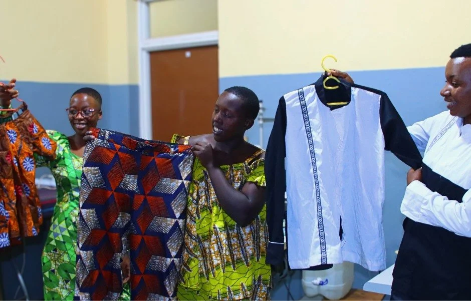 This week in our sewing training program, three young women held up something they had never held before: clothes they made with their own hands.

Jeannette Uwamahoro dreams of becoming a professional tailoring teacher. Gloria Uwase hopes to open a l