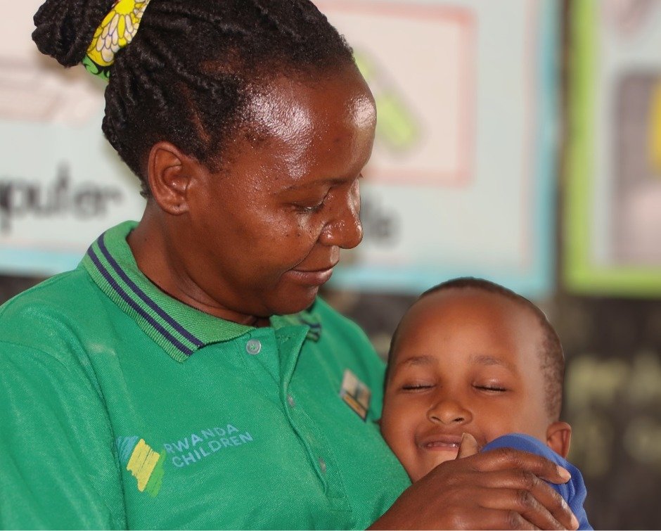 Teacher Annet Namuwonge carried Ella Mushikiwabo through the classroom &mdash; and Ella rested her head on Annet&rsquo;s shoulder with the quiet confidence of a child who knows she is held.

This is the daily reality of Rwanda Children&rsquo;s Early 