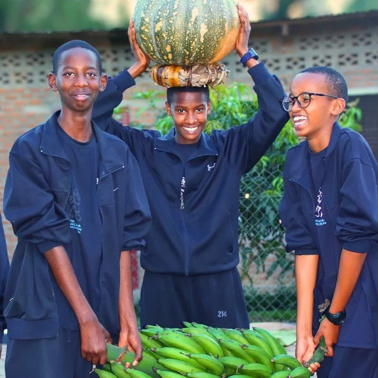 This week, Kenny, Nita, and Abigail spent the morning in the garden before carrying the harvest to the kitchen.

Kenny carried igitoki &mdash; green bananas. Abigail balanced an igihaza &mdash; a pumpkin &mdash; on her head, smiled the whole way.

Ke