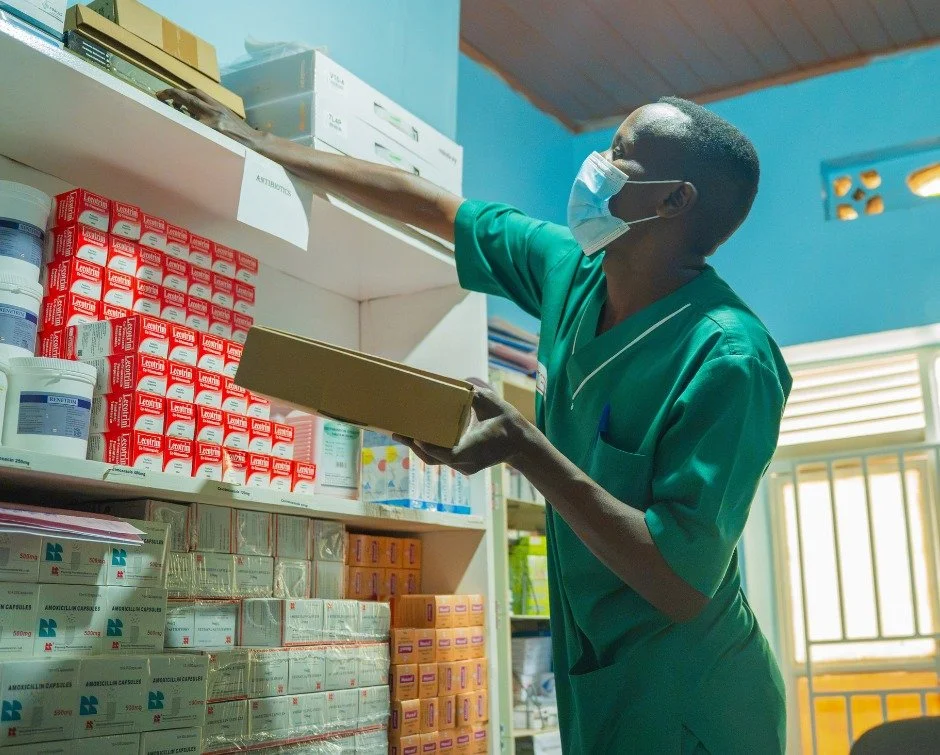 Behind every patient who receives care is someone making sure everything is ready before they walk through the door.

That's what Marc Munyazikwiye is doing here.

One of our Health Center nurses, Marc is carefully organizing and monitoring medical s
