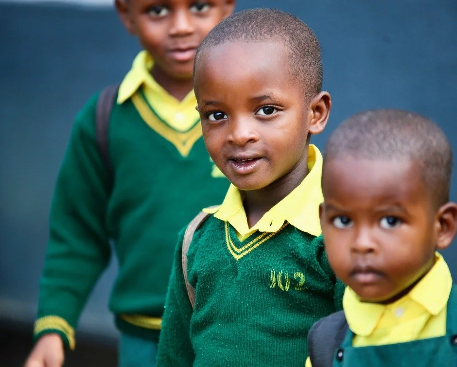 Happy Friday from Ntarama.

One grin.

One very serious little face.

And three children making their way home after another day at school.

Another week of lessons learned.

Another week of friendships growing.

Another week of young lives being sha