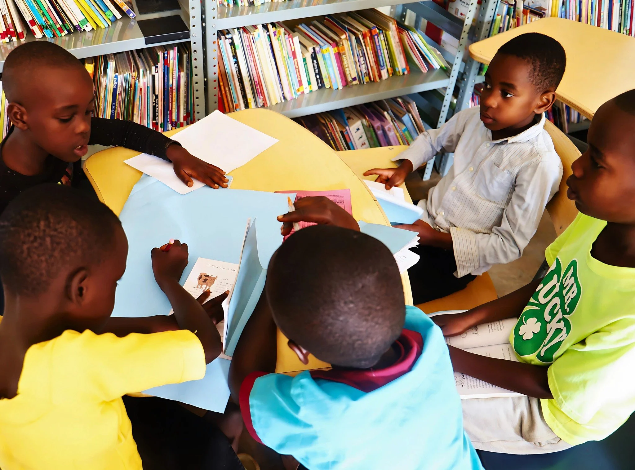 The school year may be on break, but learning doesn't have to be.

During the summer, children from our surrounding community are welcome to spend time on the Rwanda Children campus: reading in the library, creating art, playing basketball, and enjoy