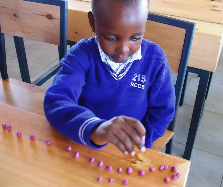 Learning can be hands-on. Shami, one of our RCCS Primary students, is practicing his counting skills using small clay balls he has made. A simple classroom activity is giving him an opportunity to practice numbers, concentration, and early math skill