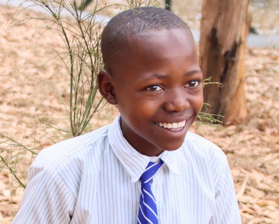 Albertine tells us she is very happy to be back in school at RCCS.

And that smile tells us quite a bit, too.

Welcome back, Albertine!
