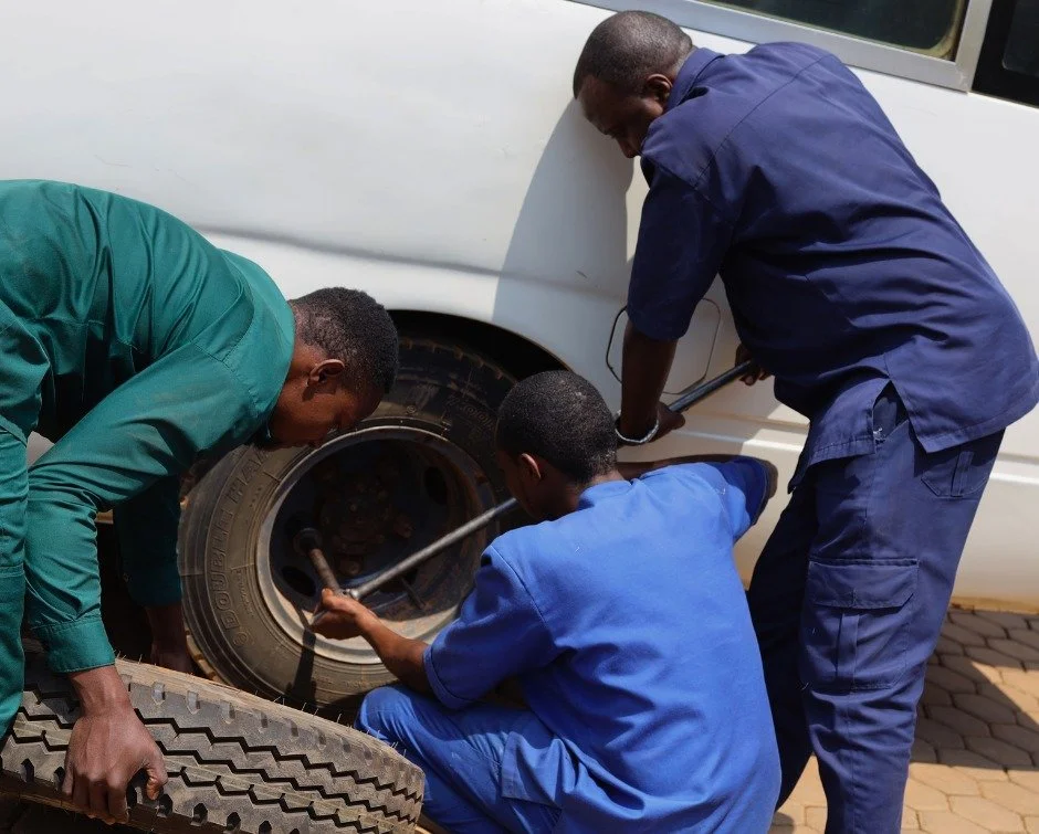 Twenty minutes.

That's how long David, Patrick, and Samuel had to get one of our school buses back on the road after a flat tire just before students were due to head home.

They got it done.

&ldquo;When we work together as one team, challenges bec