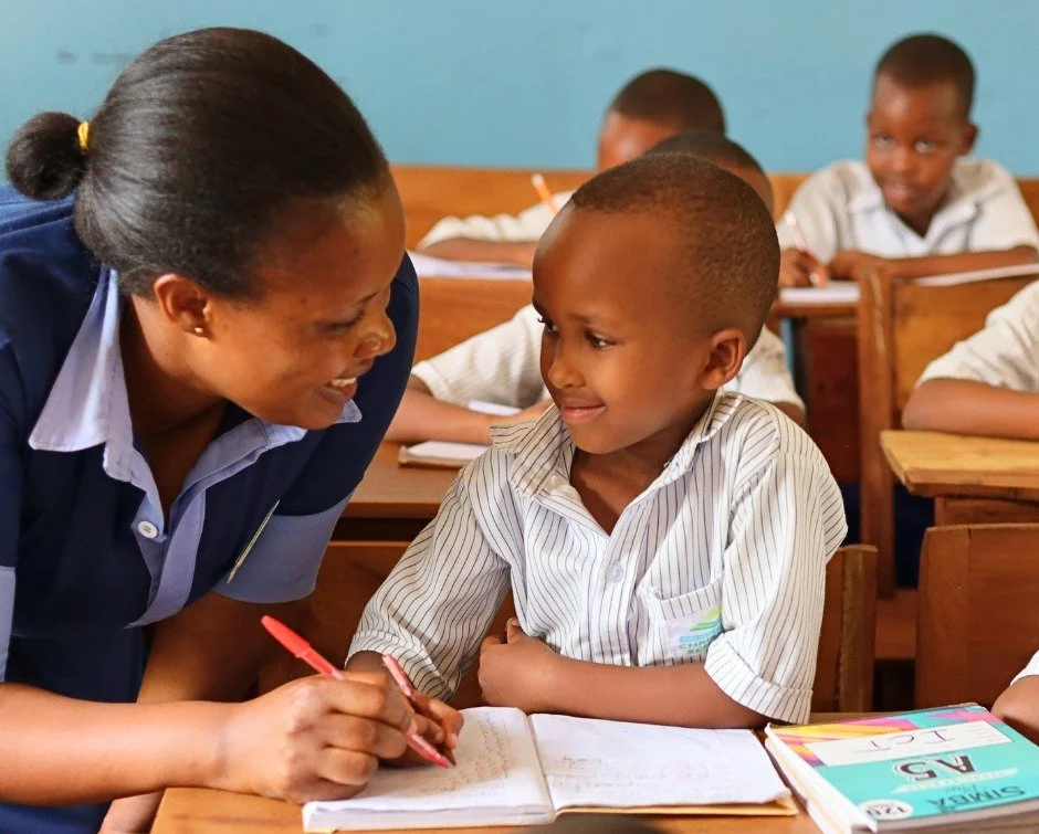 Some lessons take a little more work.

Ella is 6 years old and in Primary 1 at RCCS. This week, she worked alongside her teacher, Angelique Niyonagira, on a math lesson that wasn't coming easily.

Drawing on Joshua 1:9, Angelique offered a simple rem