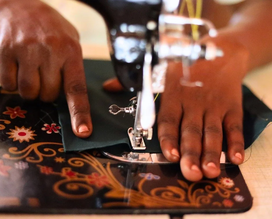 A lot of work is happening under that sewing machine needle.

Women in our sewing training program are learning skills they can eventually use in our campus-based sewing cooperative or in their own businesses.

All of the women in the current class a
