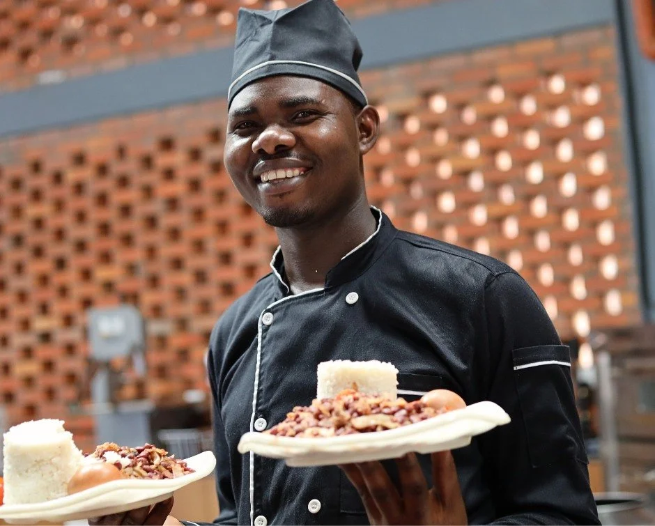 1,038 students are waiting for lunch.

Head chef Baptiste Habineza and his kitchen team prepare the meals served at Rwanda Children Christian School each day.

This week, rice, beans, and eggs were on the menu.

Baptiste has a simple philosophy: &ldq