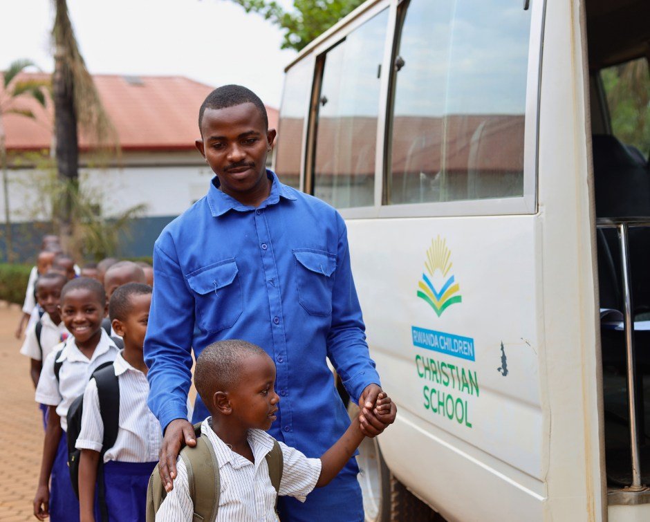 For the children who ride the school bus, the day starts with Ramadhan.

He drives a Rwanda Children Christian School bus. As he loaded the children for this afternoon&rsquo;s route, he had one hand on a small shoulder and the other holding a small h