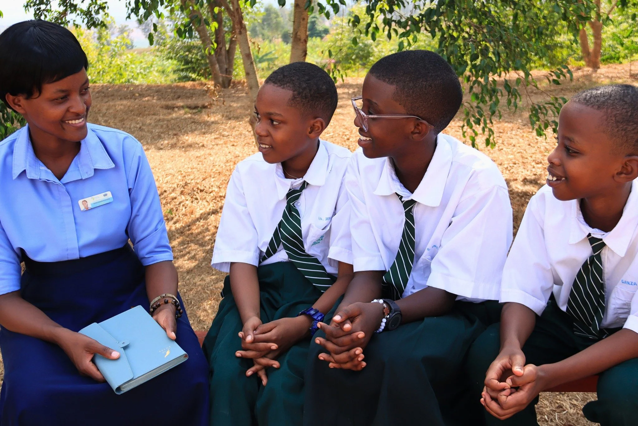 At recess, three RCCS Senior 1 students sat with Emerance Banzusenge, the girls&rsquo; matron, who helps oversee their daily care and life in the dormitories. They were talking about what they want to be.

Johannes wants to be an animator and designe