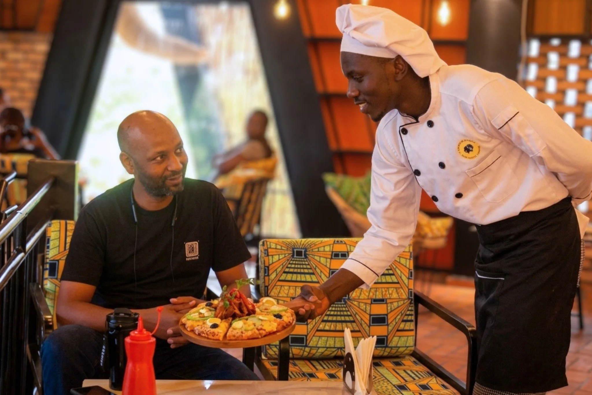 Happy Friday!

Patrick Bagina comes to Yellow Elephant Coffee Shop for more than a cup of coffee.

He works at a Kigali-based software and branding company and appreciates the quiet working environment, quick service, and welcoming staff.

The coffee