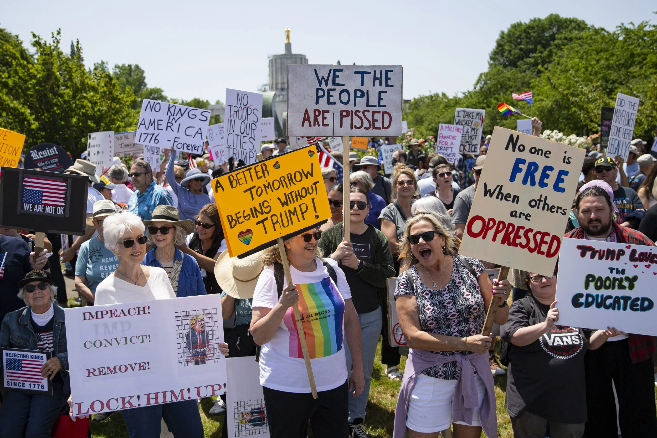 Protestors rally President Donald Trump during the "No Kings" rally at the Oregon State Capitol on Saturday, June 14, 2025, in Salem, Ore.