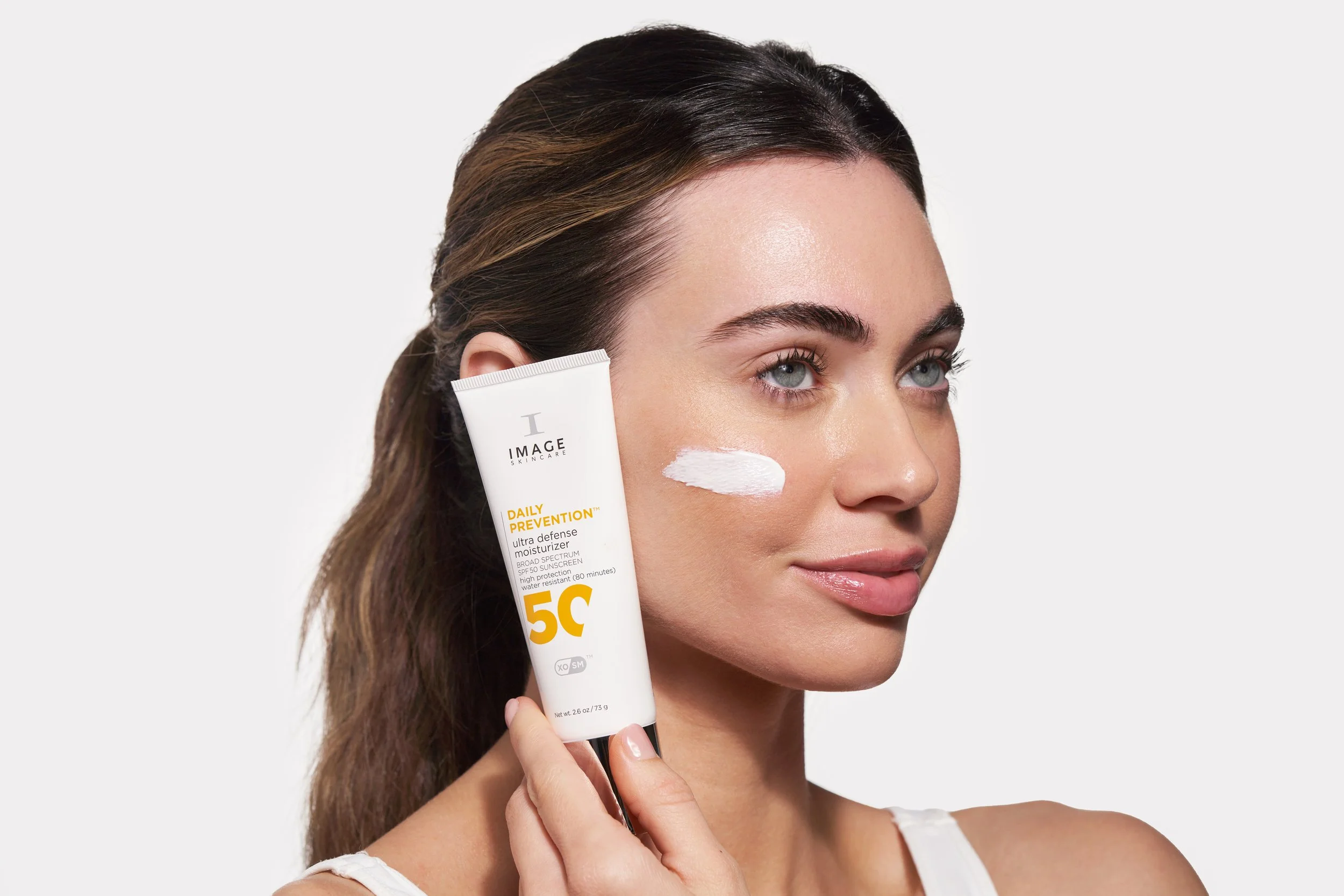 DAILY_PREVENTION_ultra_defense_moisturizer_SPF50_model.jpg
