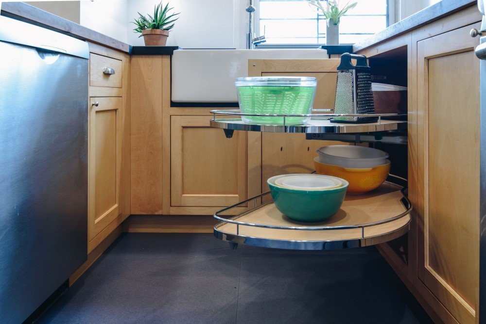Plain-and-Fancy-corner-cabinets-storage-space.jpg