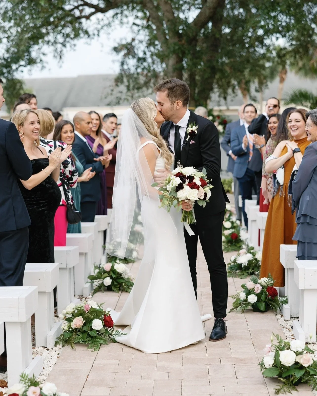 bride and groom kissing