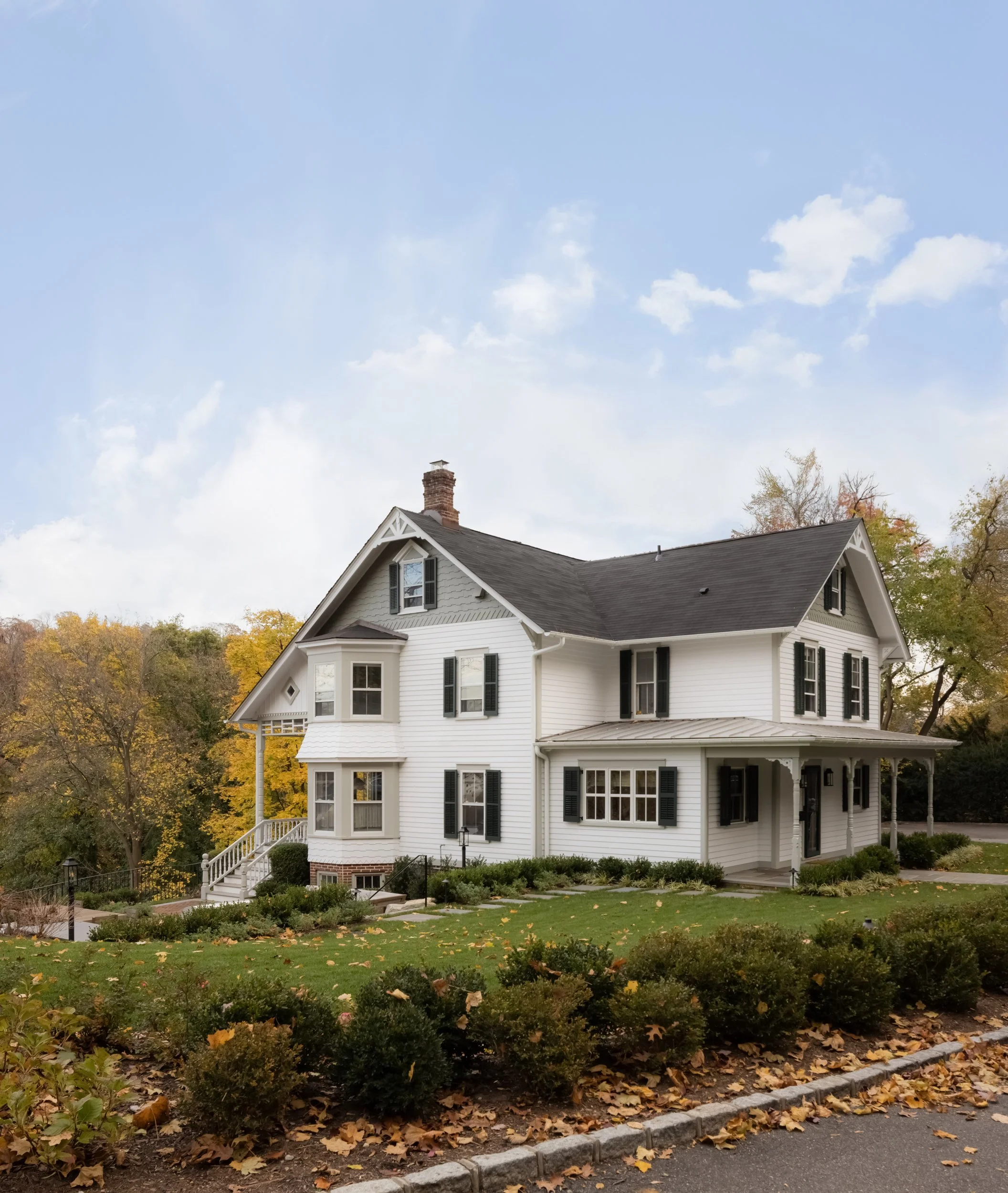 Exterior rooftop view of residential home by Raquel Langworthy