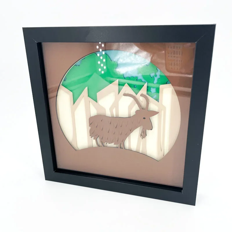 Layered paper art by Bright Basement Arts