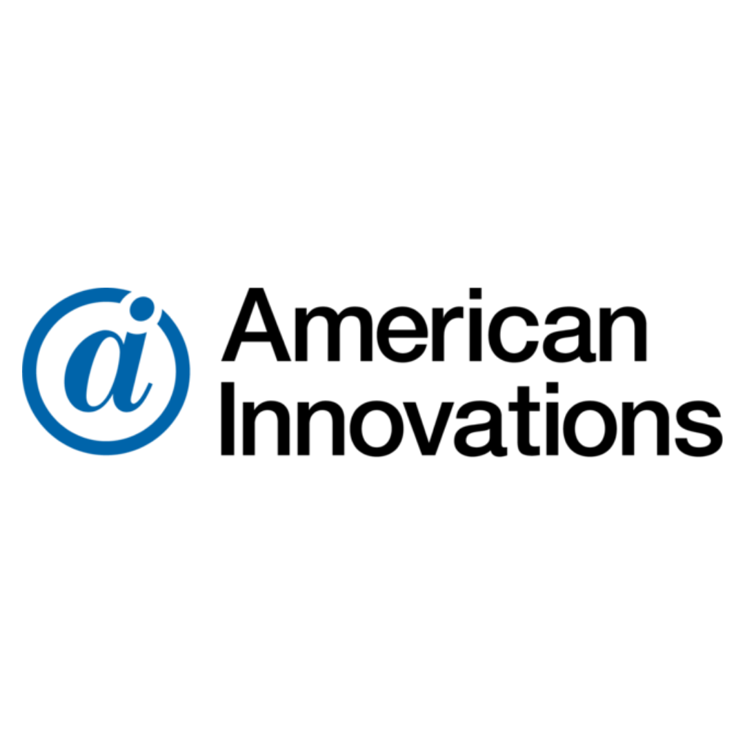 Black background with blue 'at' symbol in the lower left corner.