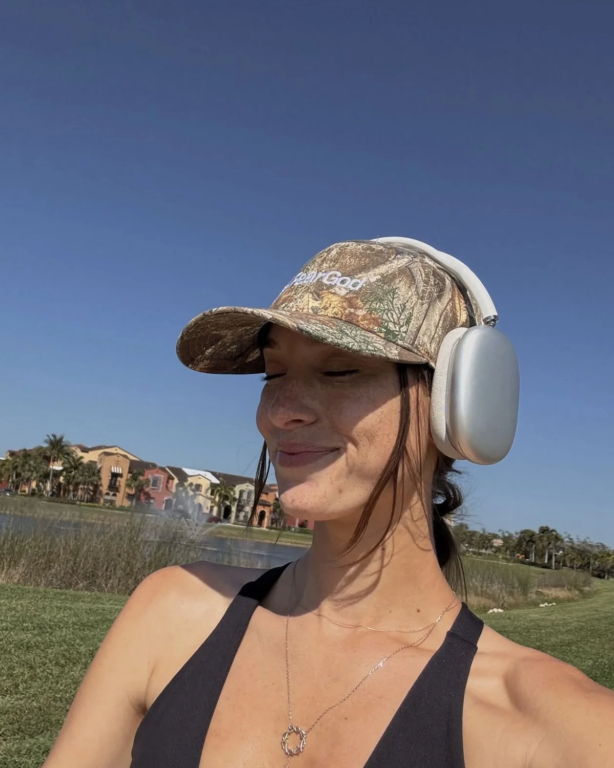 Christian camo trucker hat with inspirational message, faith-based accessory from My Father’s Business.