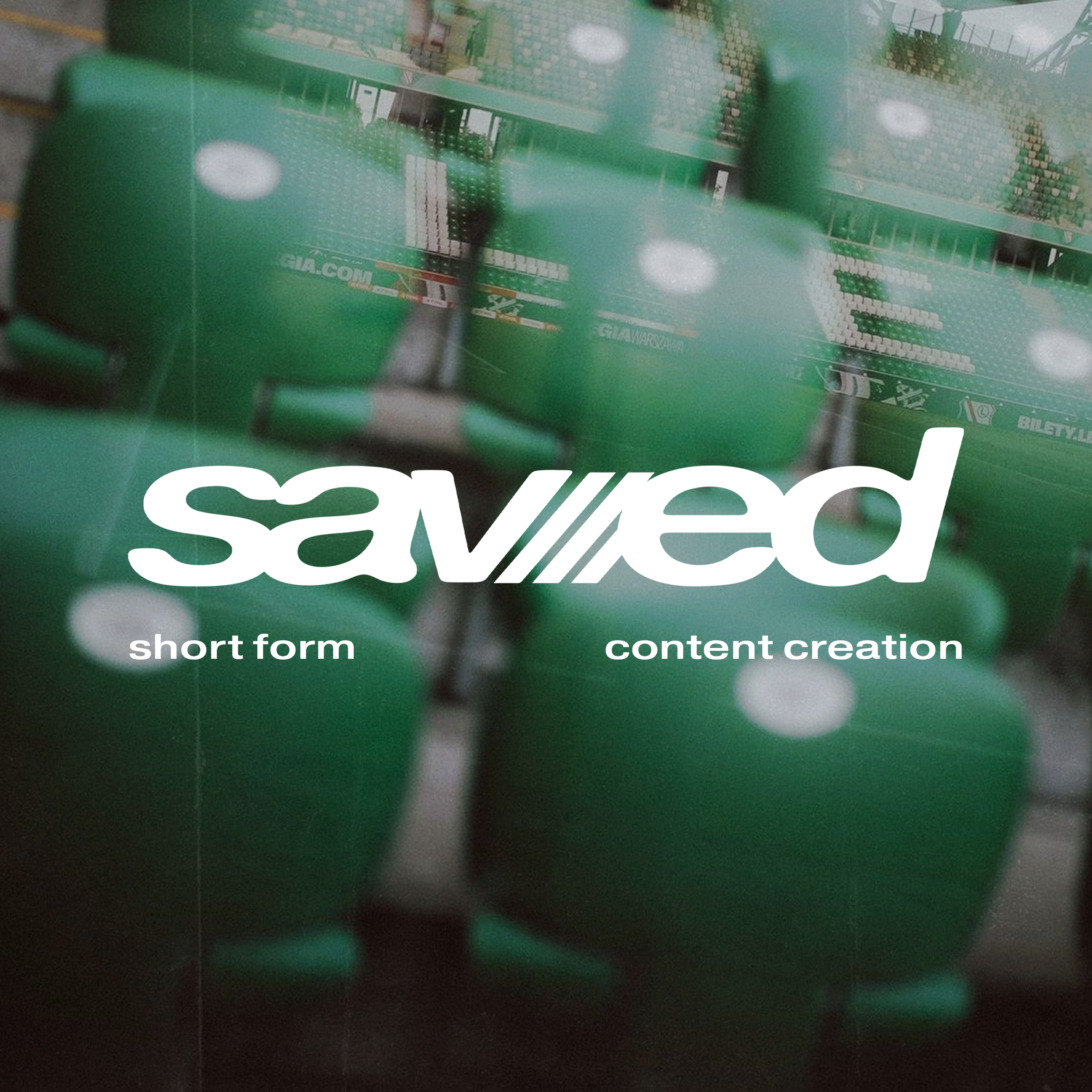 Blurred green stadium seats with white lights and advertisements, with overlaid white text reading 'saved short form content creation'.