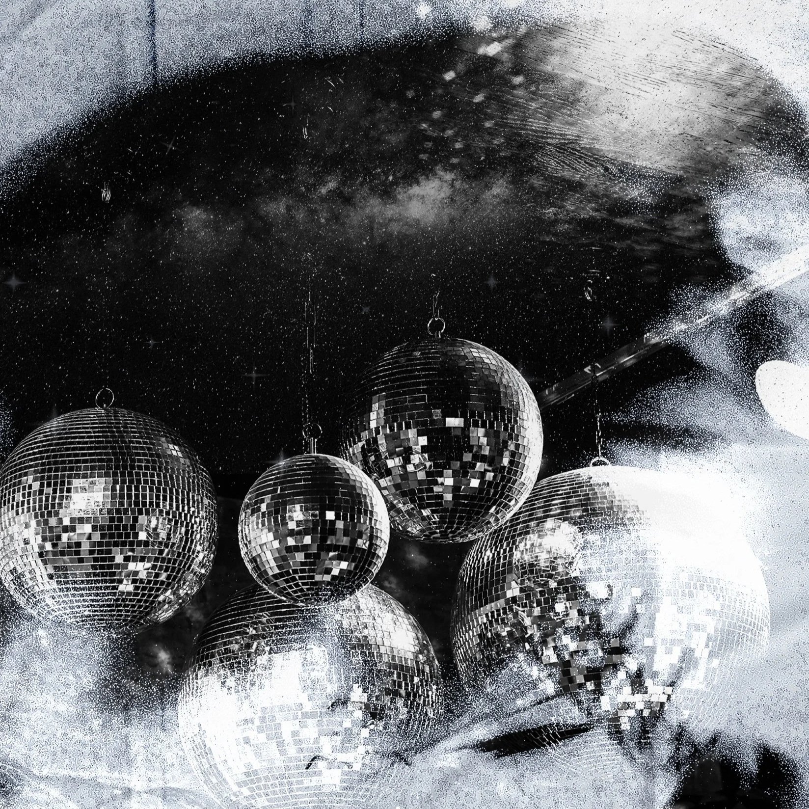 Multiple disco balls hanging from the ceiling in a space-themed setting with stars and a galaxy mural in the background.