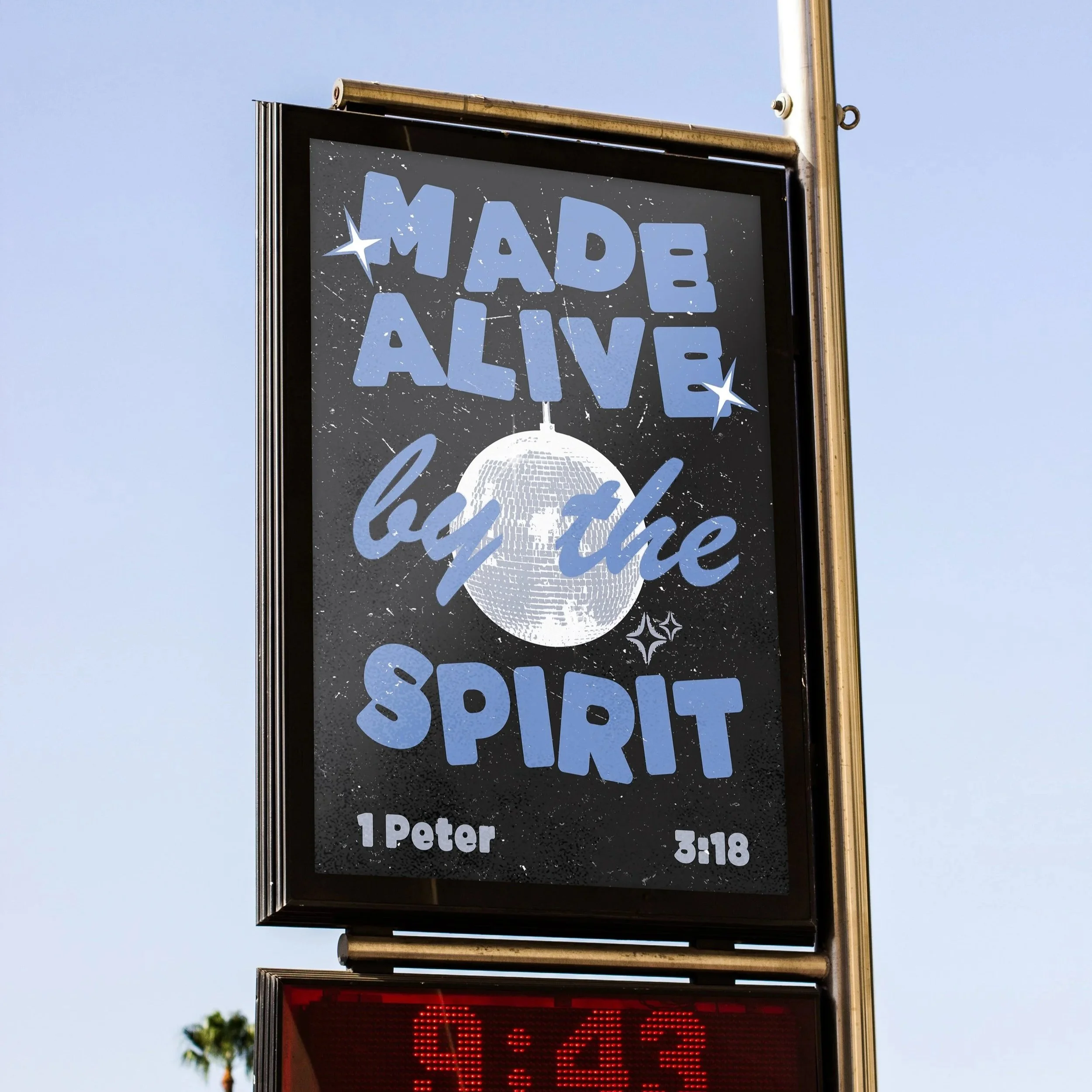 A digital billboard with a space-themed design displays the message 'Made Alive by the Spirit,' featuring a disco ball and stars. Below the sign, a red digital clock shows the time 9:43.