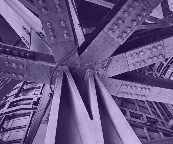 Photo of steel beams interlocking in building structure