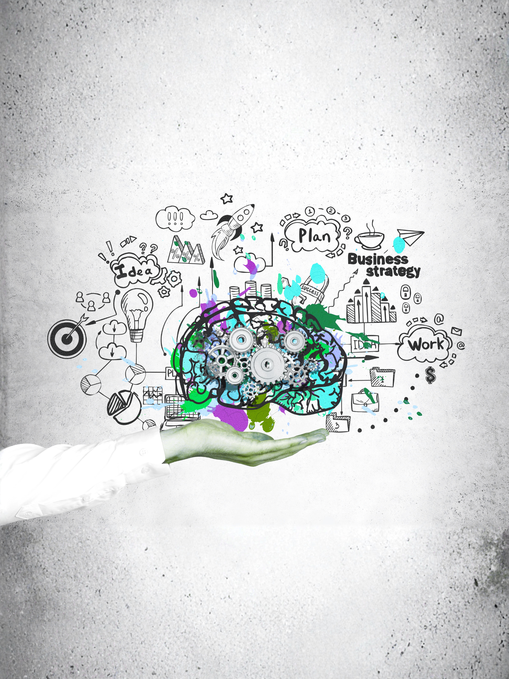 Hand holding an illustration of a systems drawing