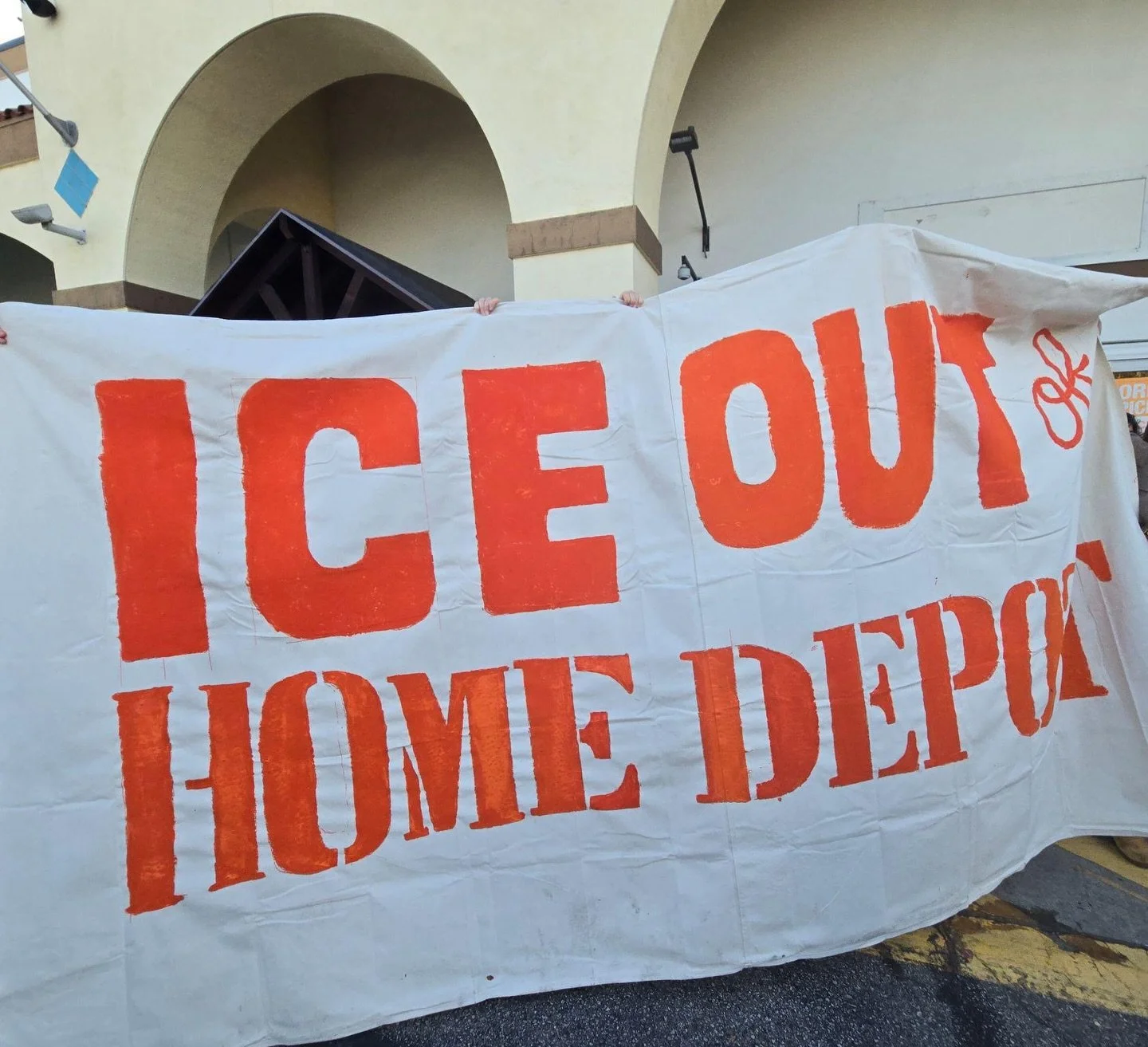 Board member Catherine  helped NDLON create their banner today at the action in Monrovia! If you&rsquo;re free come out!