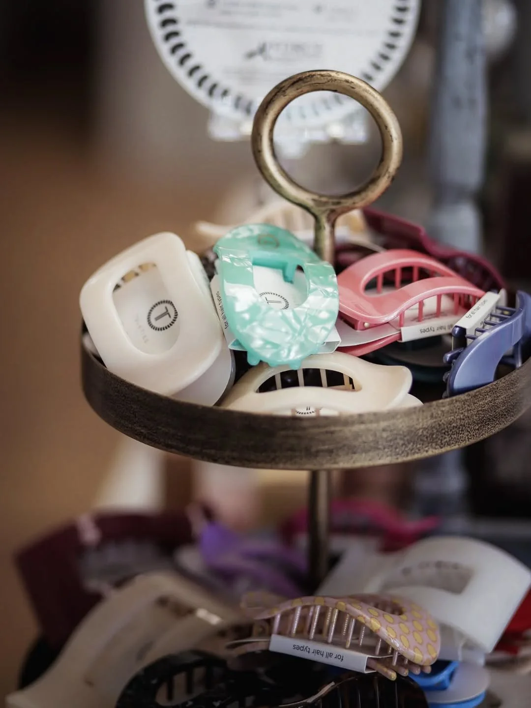 🌿🌸✨️ These are fun! Check out our wide selection of @tele_ties hair clips! They hold well &amp; are so cute! Perfect solution to wild hair when you head out for a hike or workout! We'd love to see you in our boutique today. ✨️🌸🌿